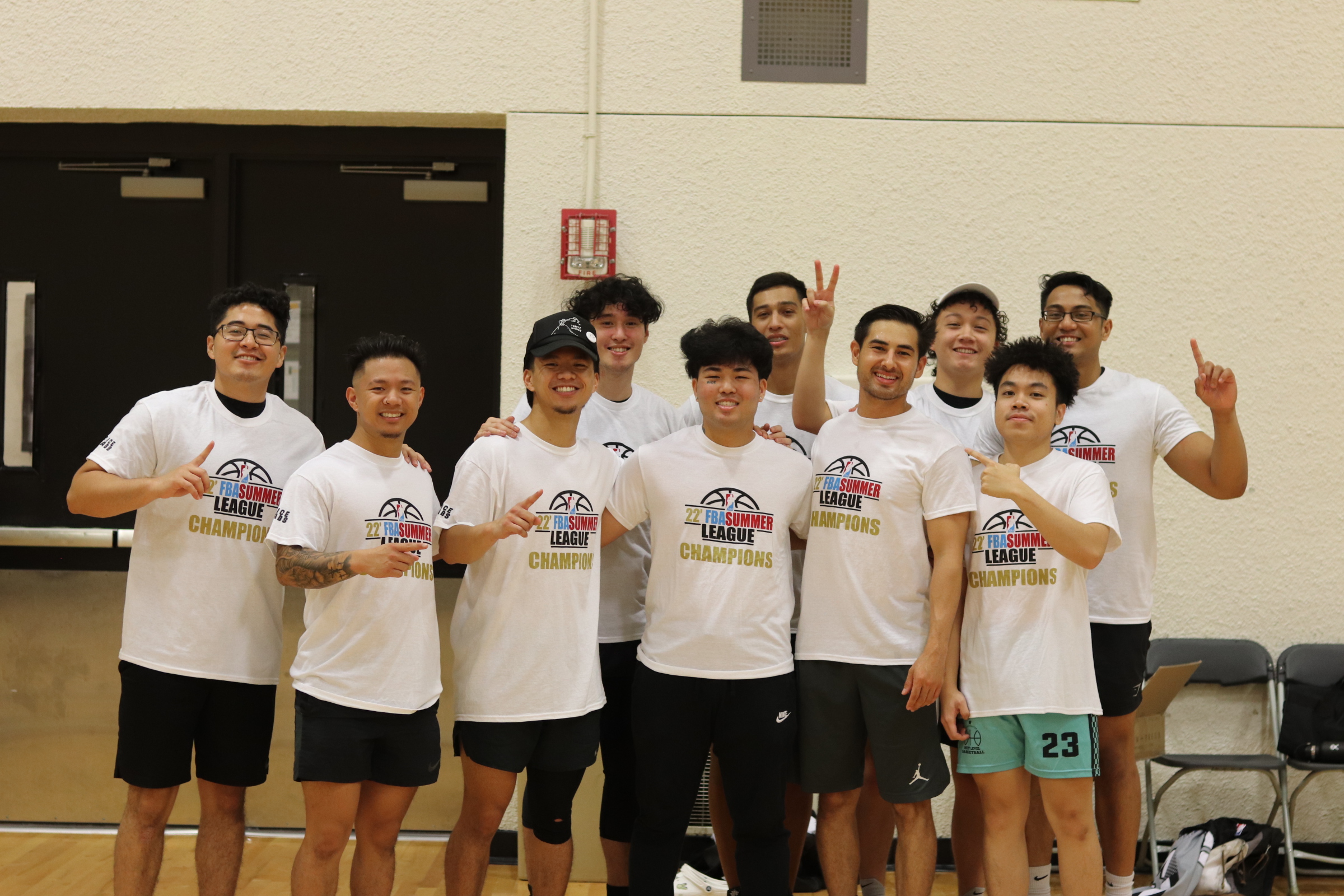 Completed apparel program group wearing coordinated finished garments.